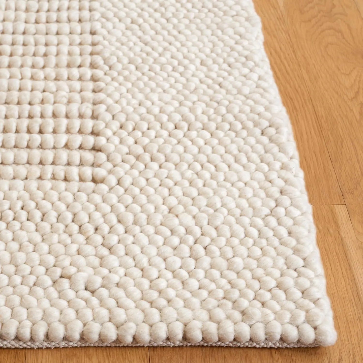 SAFAVIEH Natura Collection Area Rug - 5' x 8', Ivory, Border Design, Handmade Wool, Ideal for The Living Room, Bedroom, Dining Room (NAT130A-5)