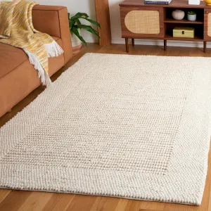 SAFAVIEH Natura Collection Area Rug - 5' x 8', Ivory, Border Design, Handmade Wool, Ideal for The Living Room, Bedroom, Dining Room (NAT130A-5)